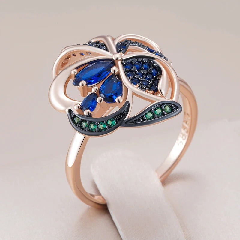 18K Rose Gold plated ring with sapphire crystals and emerald zirconia