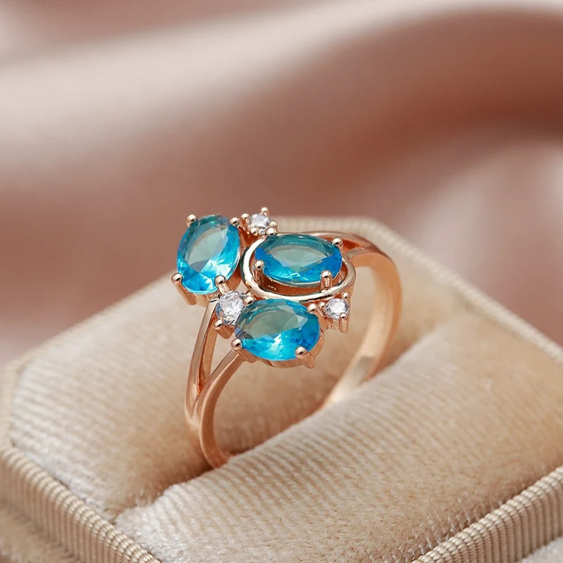 18K Rose Gold plated Ring with three aquamarine crystals