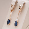 Long hoop earrings with sapphire cubic zirconia and white cubic zirconia in 18K Rose Gold Plating - AC