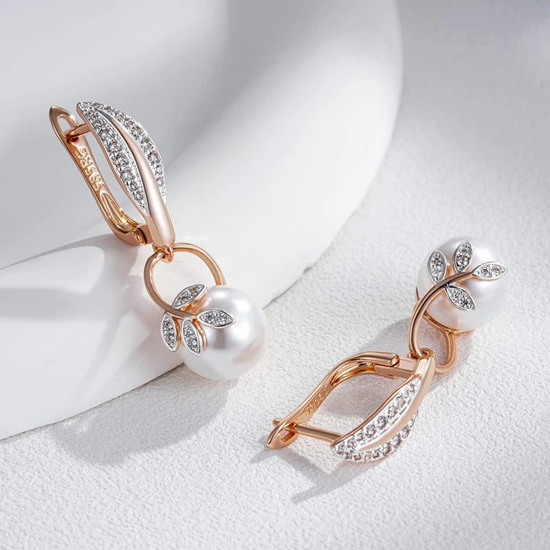 Earrings with pearl pendant and white zirconia leaves in 18K rose gold plating - AC